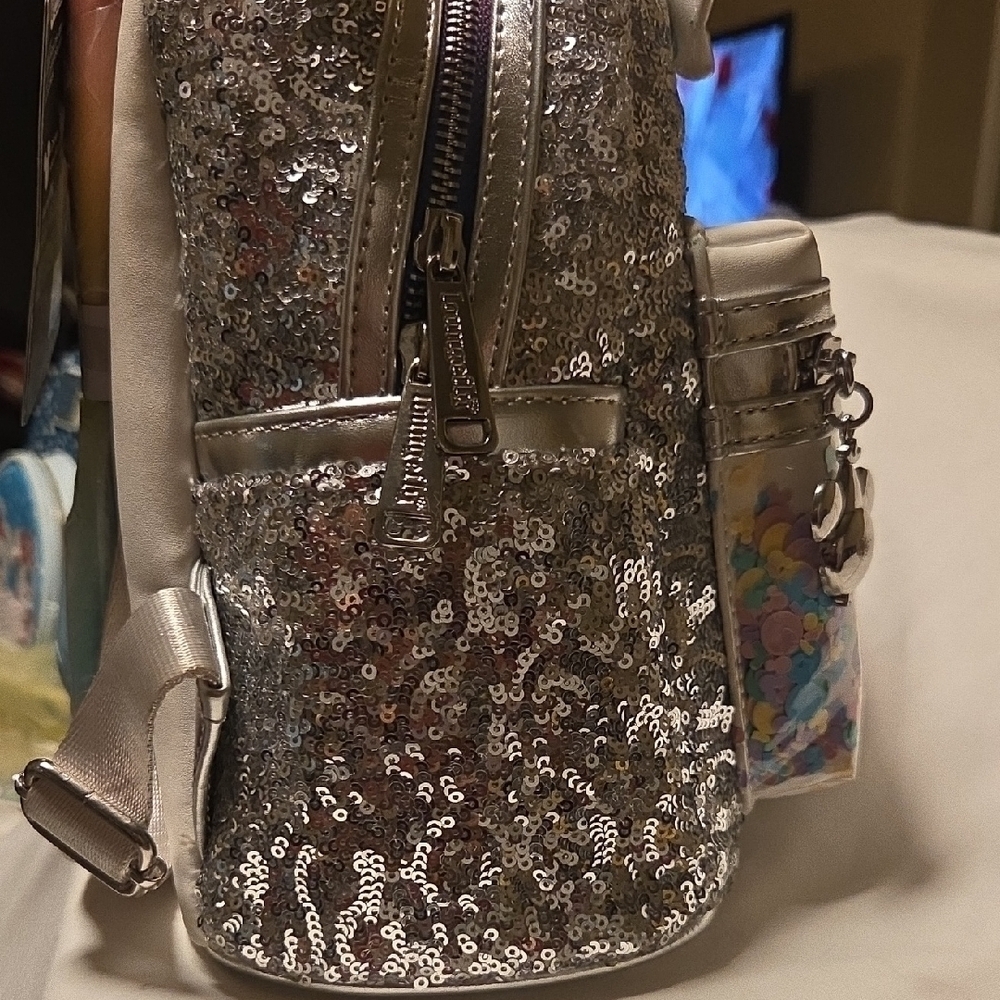 Loungefly Silver Sequin Backpack with Colorful Bow - Picture 3 of 12